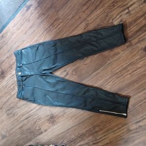 White House Black Market Black coated denim pants. Size 10 skinny ankle style